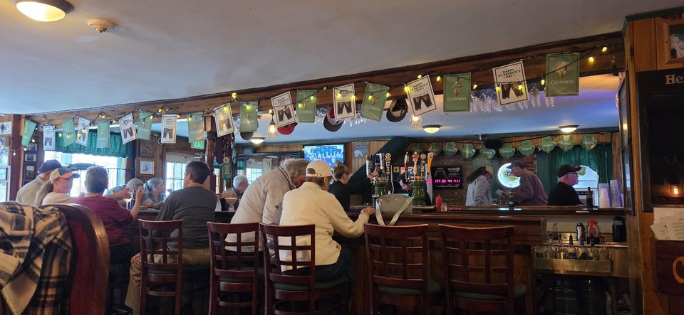 Historic bar and grill with rustic stone walls.